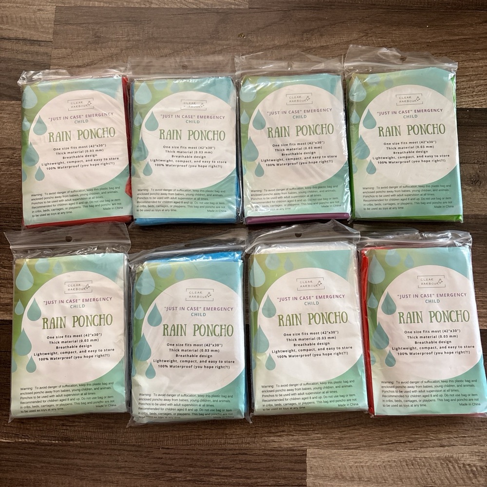 Set of 8 new kids rain poncho. Child poncho